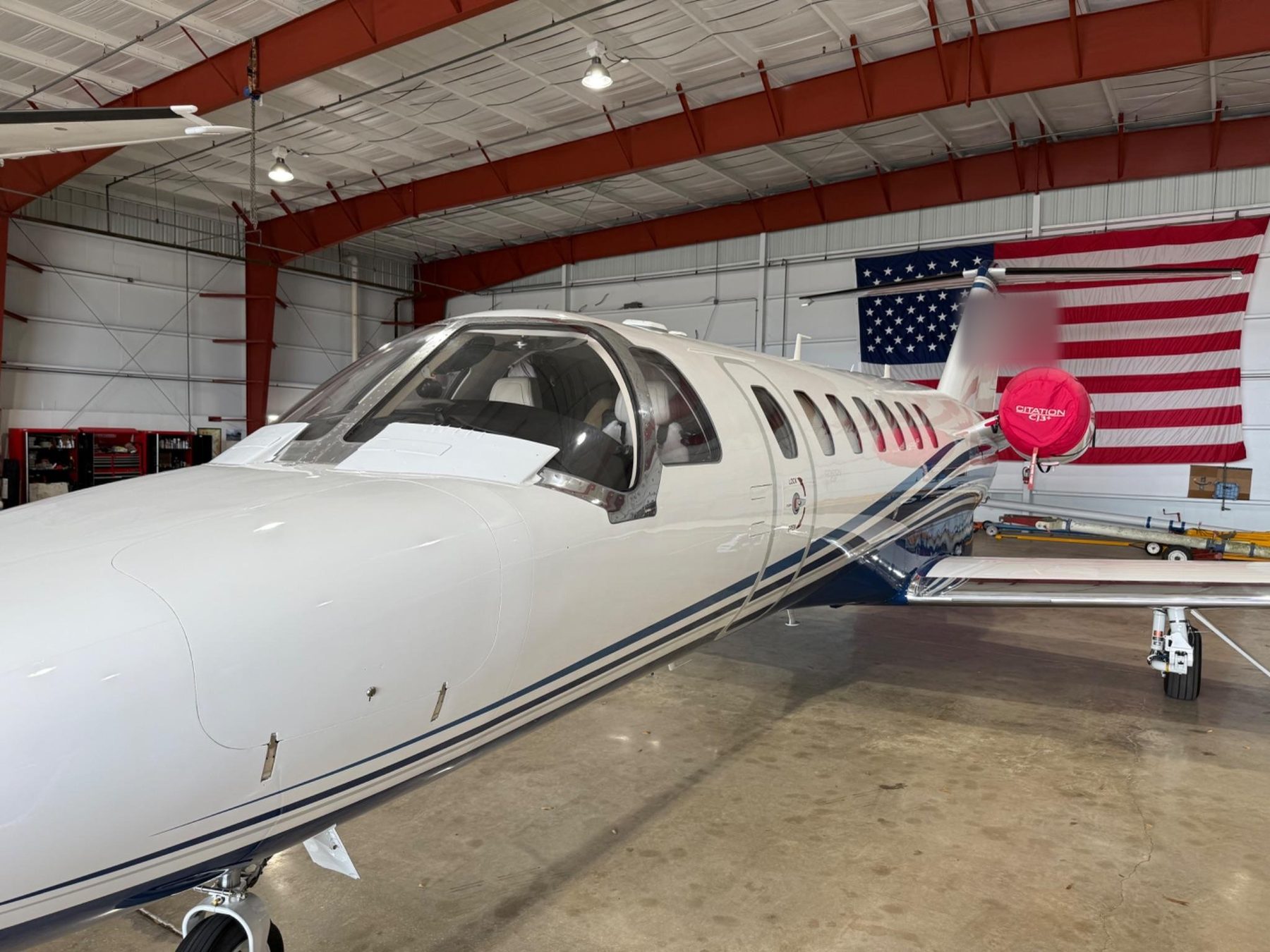 Citation jet interior with American flag backdrop