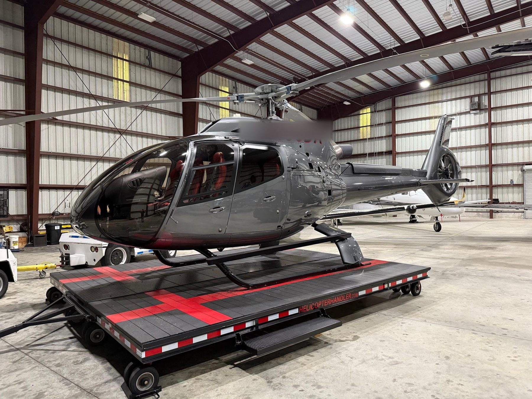 Detailed helicopter in hangar